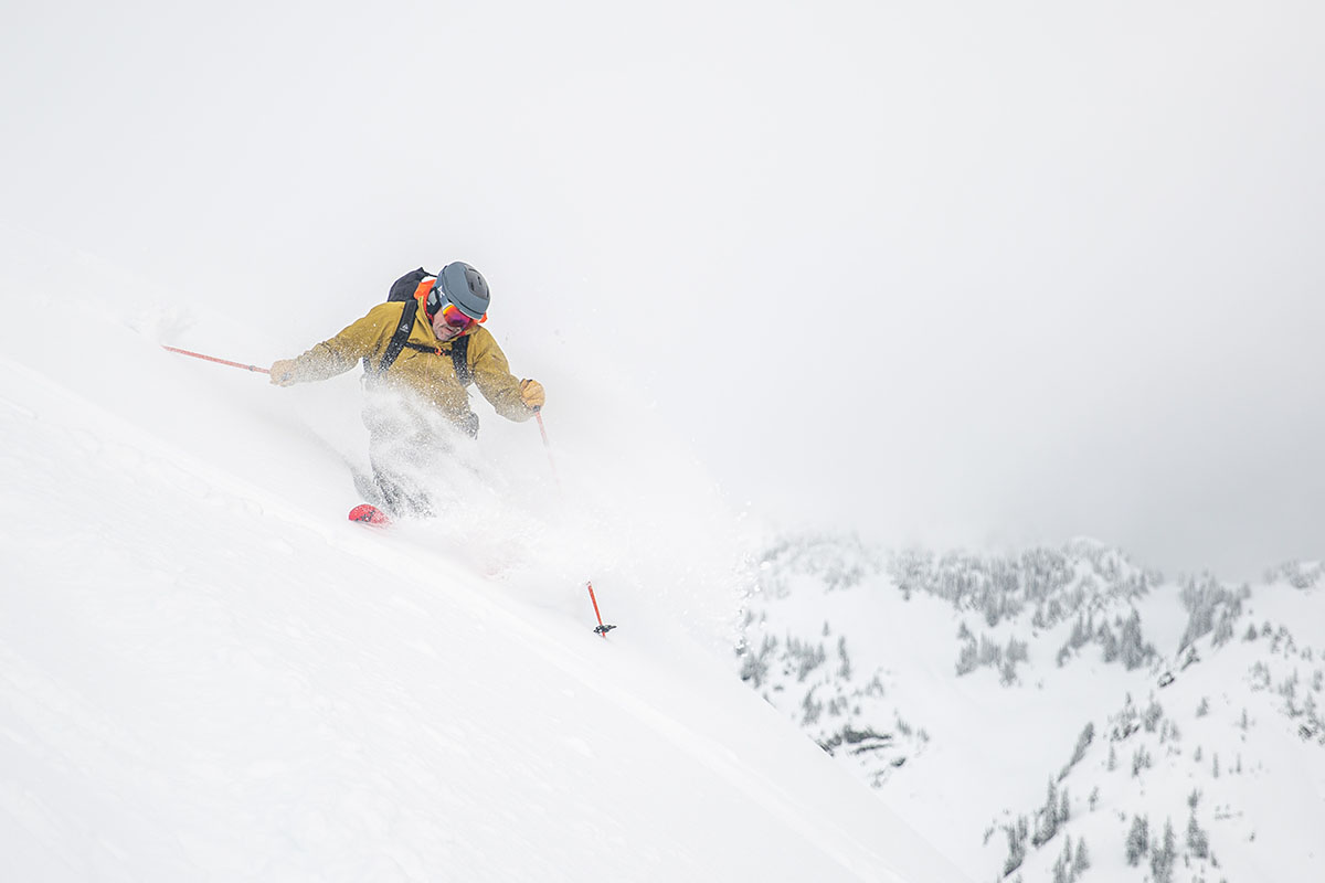 Arc'teryx Sabre Jacket (skiing down steep slope in powder)